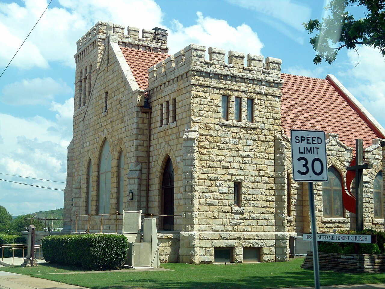 Ozark, AR street scene near Fort Smith, where we provide hail damage roof repair