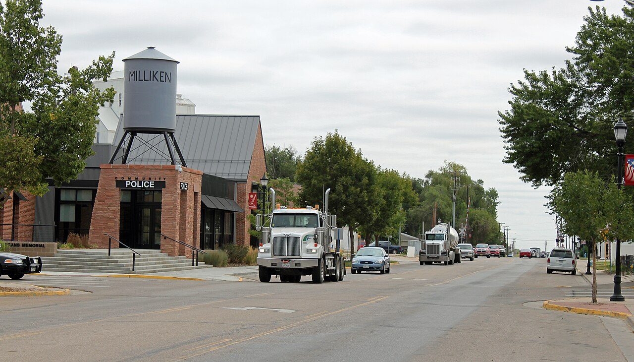 Milliken, CO street scene near Greeley, where we provide hail damage roof repair