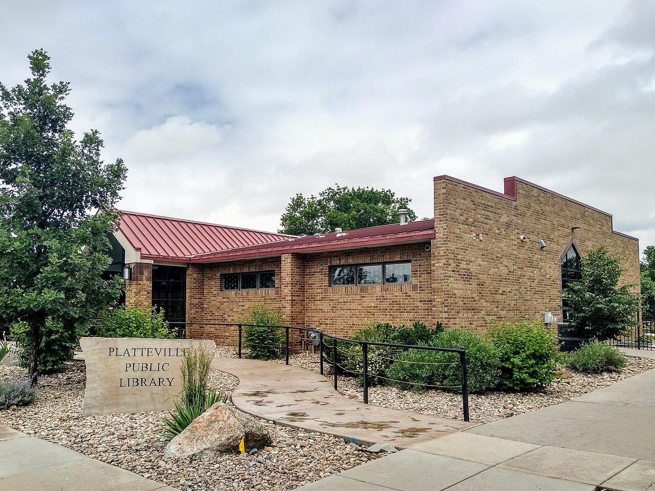 Platteville, CO street scene near Greeley, where we provide hail damage roof repair